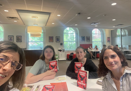 Group of women reading "The Penelopiad" al book club. 
